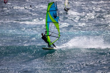 Windsurfers in windy weather on the coast of the island of Tenerife 01 08 2022