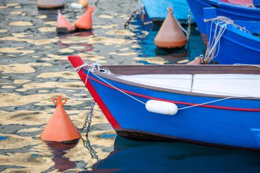 Fishing boats in the harbor of Matera, Puglia, Italy clipart