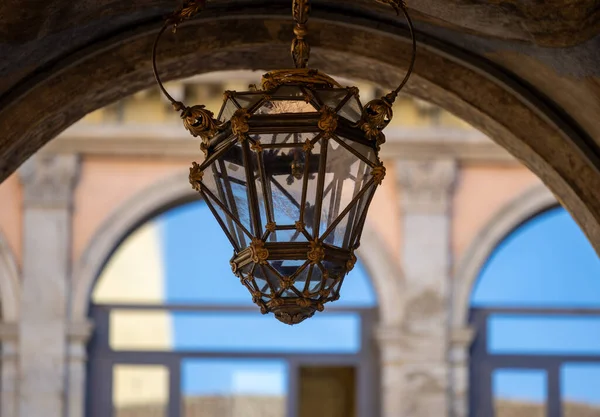 Old wall street lighting in the old town of Bologna. Italy