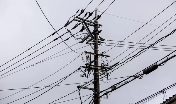 A lot of electric wires on a pole, electricity transmission in Japan
