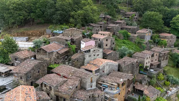 stock image Talasnal: A Tourist Marvel in Portugal with Ancient Architecture, Stone Houses, and Narrow Alleys Captured by Drone on Jun 19, 2024