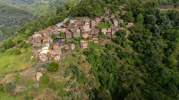 stock image Talasnal: A Tourist Marvel in Portugal with Ancient Architecture, Stone Houses, and Narrow Alleys Captured by Drone on Jun 19, 2024