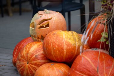 Autumn lanterns and pumpkin arrangements, preparing for Halloween celebration. Autumn clipart