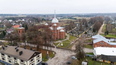 Lithuania. Utena's Church of Christ's Ascension and the Old Cemetery from a Bird's Eye View 11 11 2024 clipart