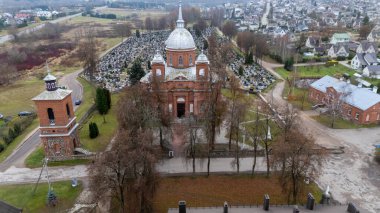 Lithuania. Utena's Church of Christ's Ascension and the Old Cemetery from a Bird's Eye View 11 11 2024 clipart