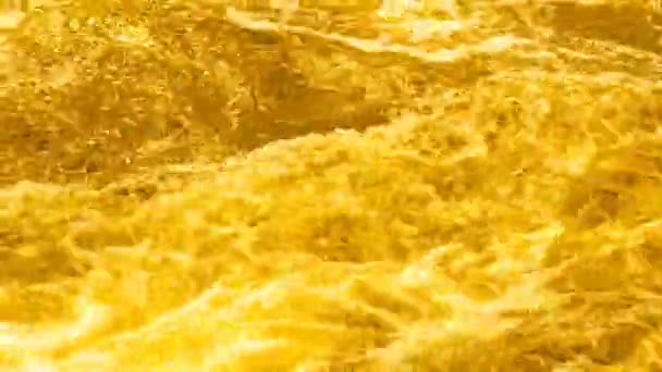 Footage Bubbling Yellow Water Golden Waves Colorful Abstract Video Background — Video Stock