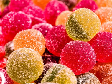 Colorful Gumdrop Candies Sugar Coated Sweet Jelly Macro Photography Delicious Dessert Treat for Kids and Adults Party Favors Snack Food Vibrant Confectionery Holiday Celebration Theme. Stock Backgroun