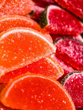 Citrus Slice Shaped Jelly Candies Sugar Coated Sweet Dessert Macro Photography Tasty Treat for Kids and Adults Party Snack Food Vibrant Confectionery Holiday Background. Stock photograph 