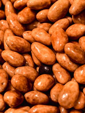 Caramel Coated Almonds Shiny Brown Sweet Treat Macro Photography Delicious Dessert Snack for Kids and Adults Party Food Vibrant Confectionery Fun Theme Holiday Celebration Indulgent HD Stock Footage