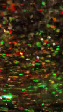 Büyüleyici Yeşil ve Kırmızı Işıltılı Soyut Arkaplan - Yüksek Çözünürlüklü Görüntü Duvar Kağıdı, Sosyal Medya, Pazarlama ve Dinamik Dijital Tanıtımlar İçin Mükemmel. 4K Yavaş Hareket Videosu 