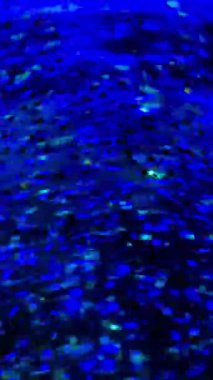 Radiant Blue Glitter Soyut Arkaplan - Duvar kağıtları, Sosyal Medya, Pazarlama ve Çarpıcı Dijital Tanıtımlar için Yüksek Çözünürlüklü Görüntü İdeal. Slow Motion Video 4K