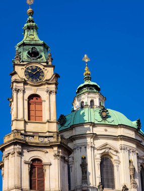 Prague St Nicholas Church Baroque Architecture with Dome and Clock Tower Historic Landmark in Czech Republic Old Town. Vertical Background . Ultra High Resolution 