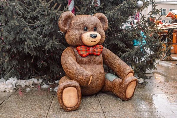 Big teddy bear toy at the Christmas market in Katowice, Poland. Retail store at Christmas in Katowice, Poland.