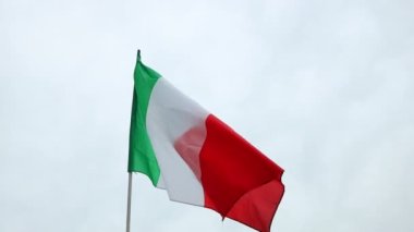 Italian flag waving in the wind. Close up of Italy banner blowing, soft and smooth silk. 