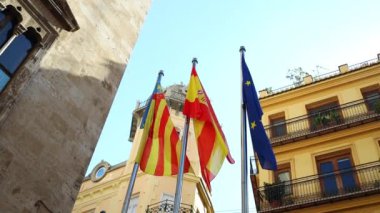 Flag of European Union and EU member flags on the background against a cloudy sky. High quality FullHD footage