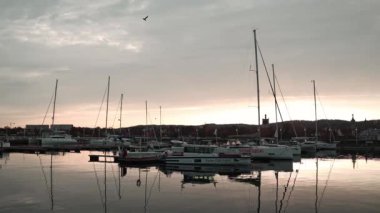 Yacht and boats parking in harbor. White sailing yachts at the pier. Sea yacht club. Aegean sea. Sopot, Poland