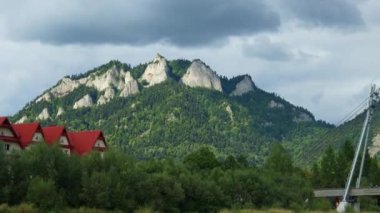 Famous Three Crowns or Trzy Korony mountain peak in Poland, Pieniny National Park. Tourist and ecosystem. Summer day. 4k