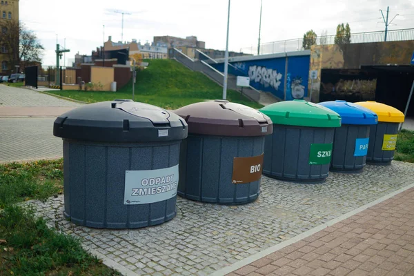 Waste Sorting And Recycling Concept.Caring about an enviroment, separating garbage into different continers
