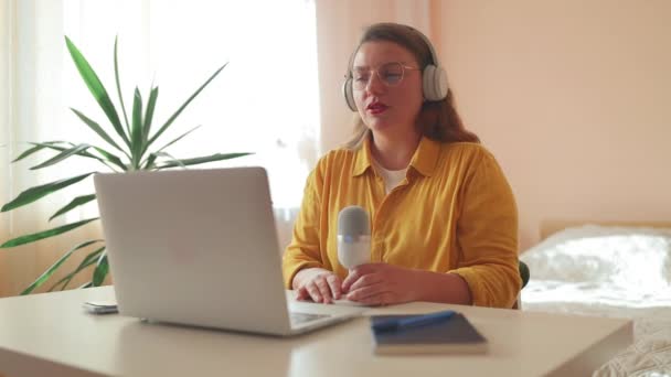 Woman Recording Podcast Her Laptop Computer Headphones Microscope Female Podcaster — Stock Video