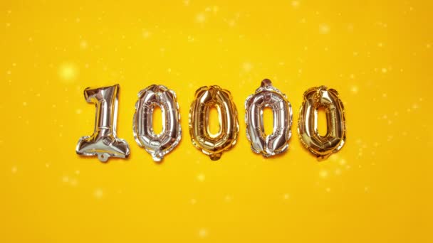 10000 Glühende Aufblasbare Luftballons Auf Goldgelbem Hintergrund Mit Kopierraum Hochwertiges — Stockvideo