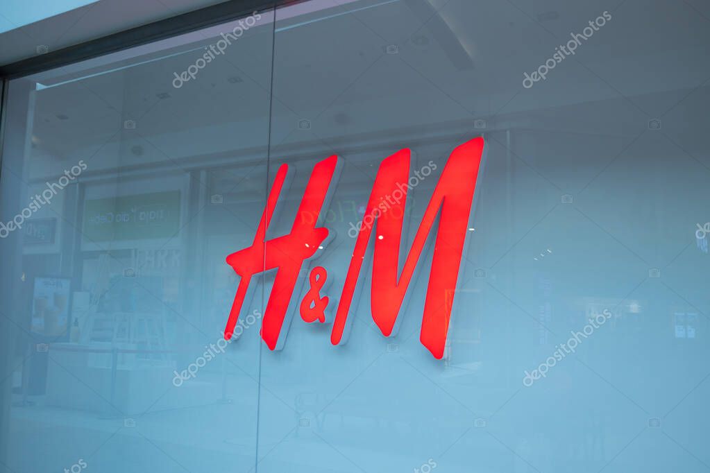 Poland, Krakow - May 2024: HM store sign. HM is a Swedish multinational clothing retail company. High quality photo
