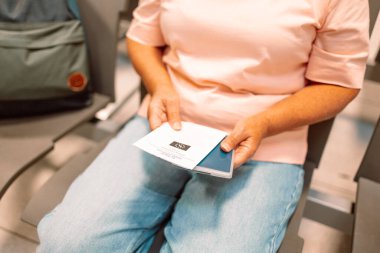 Qr code, check in and man with a phone for a ticket, airplane booking and information at airport. Travel, website and hand of a businessman reading a barcode on a mobile for a work trip or vacation