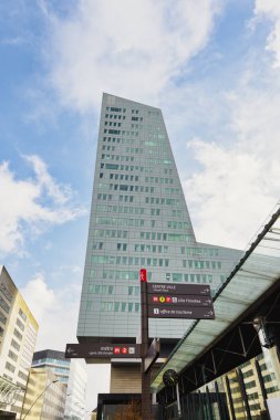 Lille, France - October 02, 2022: modern skyscraper Tour de Lille. It is an office skyscraper in Euralille, the business district of the Lille metropolitan area