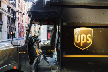 New York City, USA - October 06, 2015: UPS Van in Manhattan, Ney York City.  United Parcel Service is an American multinational shipping & receiving company founded in 1907 clipart
