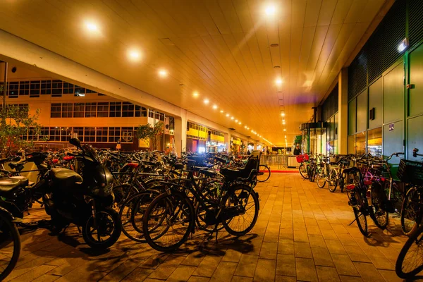night view of a bicycle parking space in the courtyard of a residential complex in the Netherlands