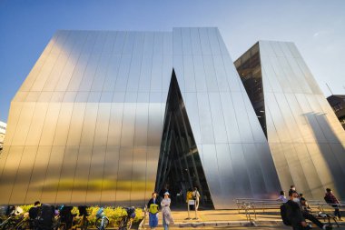 Tokyo, Japan - April, 04, 2023: modern architecture of the Sumida Hokusai Museum in Sumida with unidentified people. The museum is dedicated to the painter Katsushika Hokusai - 1760 - 1849 clipart