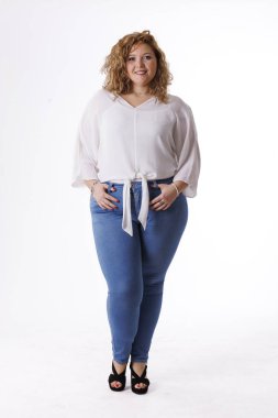 Plus size fashion model, fat woman in denim clothes and white shirt on white background, overweight female body