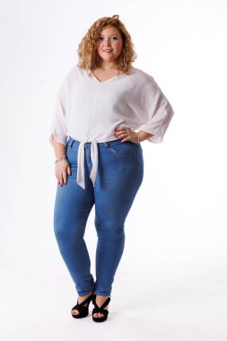 Plus size fashion model, fat woman in denim clothes and white shirt on white background, overweight female body