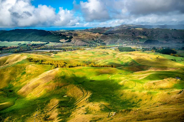 stock image Sunshine and shadows on the stunning agricultural farmland around the rural hills and valley around the Te Mata area