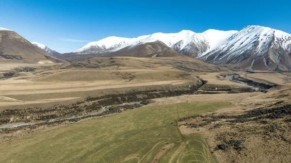 stock image Aerial scenery with a drone over the alpine Castle hill and the ski field area around Porters pass