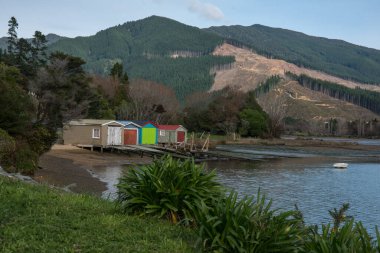 Scenery of the bays and coves in the Marlborough Sounds with some atmospheric cloud clipart