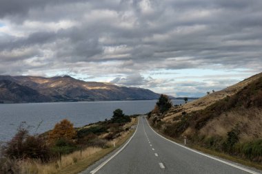 The mountains along both sides of Lake Hawea near Wanaka clipart