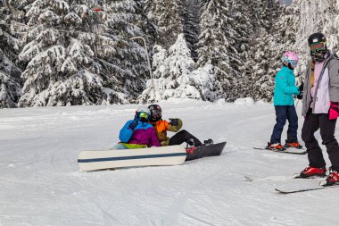 27.01. 2022 . Zuberec Ski Park. Slovakia. Western Tatras. Skiing. Skiers on the ski slope. Concept of winter vacation,  family rest , healthy lifestyle, children's entertainment, early learnin