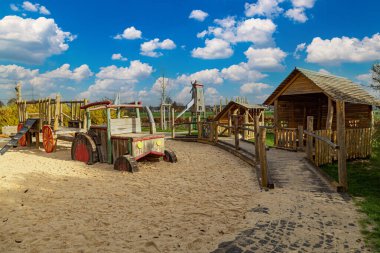 Modern children's playground in Kalbach-Riedberg district ( Ortsbezirk ) of Frankfurt am Main city. Germany. New european residential quarter, residential are