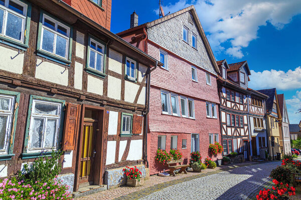 Alsfeld town. Hesse. Germany. Ancient historical city, known for its half-timbered houses. Old town, narrow medieval street, colorful facades of houses. Famous tourist destination .