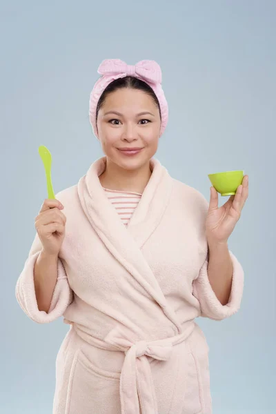 Mid Aged Asian Woman Wearing Bathrobe Holding Cosmetics Her Hands — Stock Photo, Image