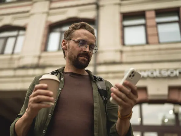 Man Enjoys Coffee Break Old City Street Checking Phone Man — Stock Photo, Image