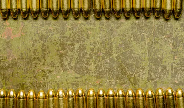 Line Spent Bullet Casings Displayed Gritty Worn Background Showcasing Aftermath — Stock Photo, Image