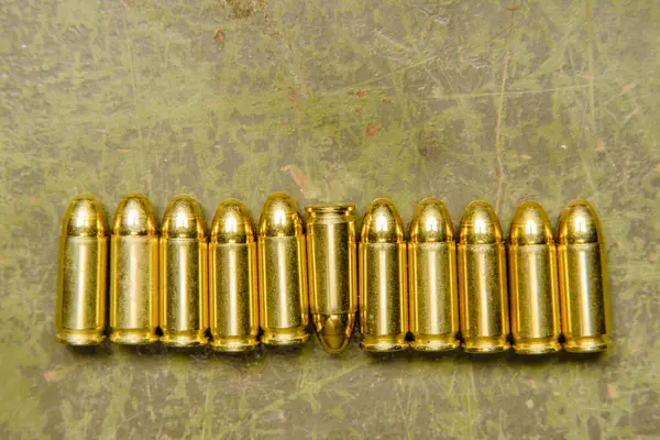 Group Spent Military Bullet Shells Arranged Neatly Top Table Surface — Stock Photo, Image