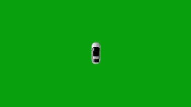 Yeşil ekran arka planında düz yolda giden bir arabanın hava görüntüsü