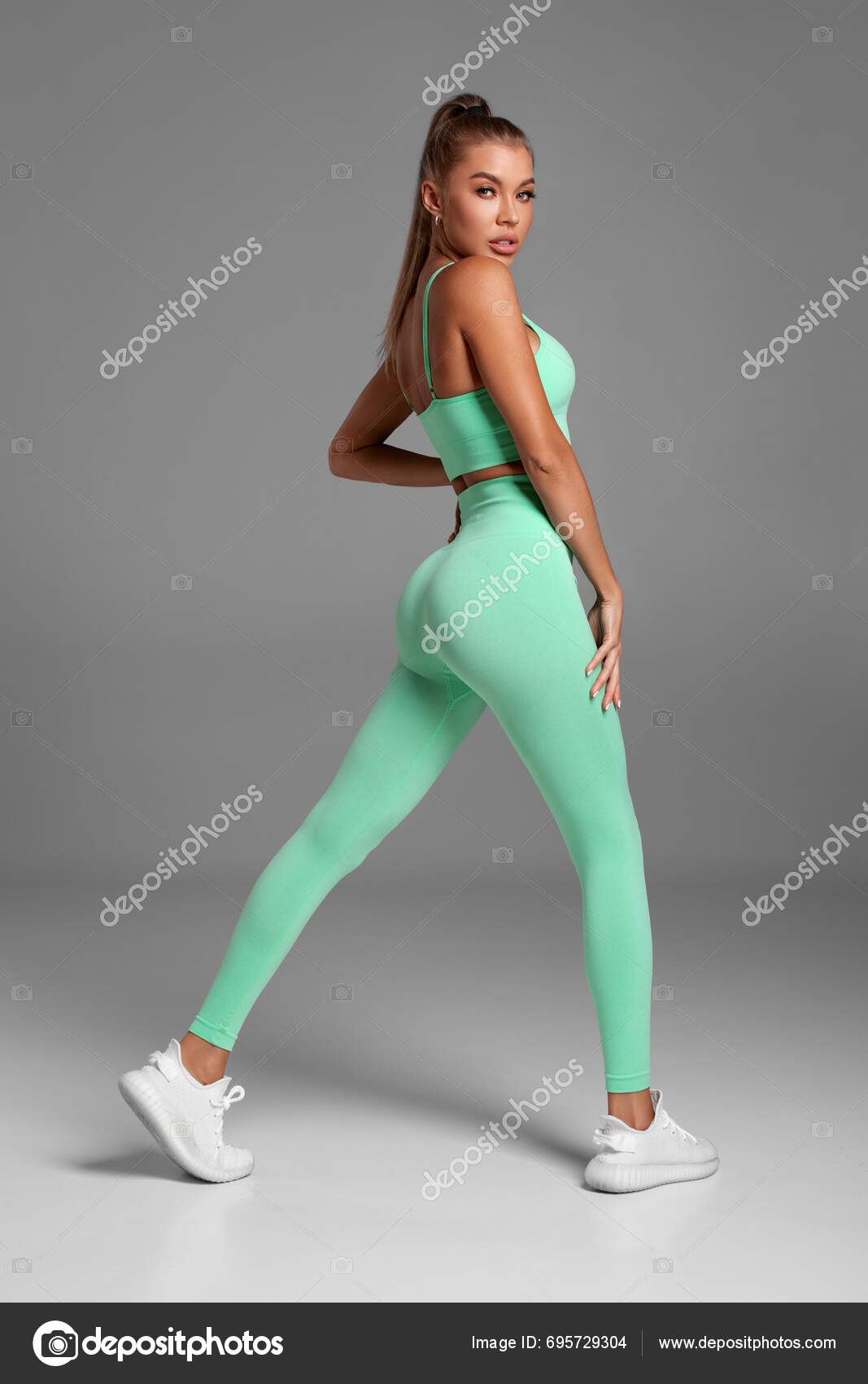 Sexy Fitness Woman Beautiful Athletic Girl Green Leggings Stock Photo by  ©Nikolas_jkd 649285210