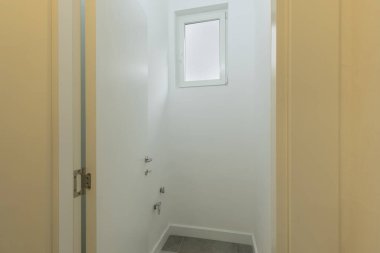 Empty small space interior for washing machine and dryer