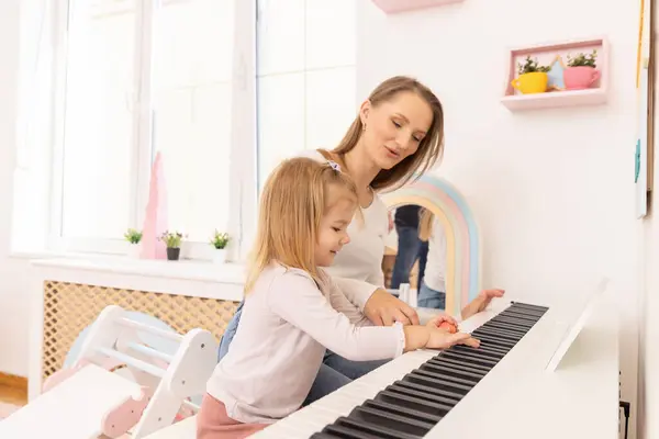 Little Girl Playing Piano Her Mother — Stock Photo, Image