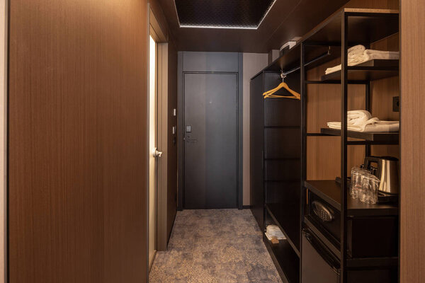 Corridor with closet in hotel room