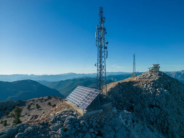 dominance fire watchtower and signal emitters at mountain peak