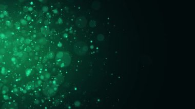 Yatay olarak uçan parlak parçacıkların renkli animasyon arkaplanı. Dinamik parçacıklar uzayda kaotik bir şekilde yüzerler. Parıldayan parçacıklar. Havada gerçek renkli parçacıklar var. 4k animasyon.